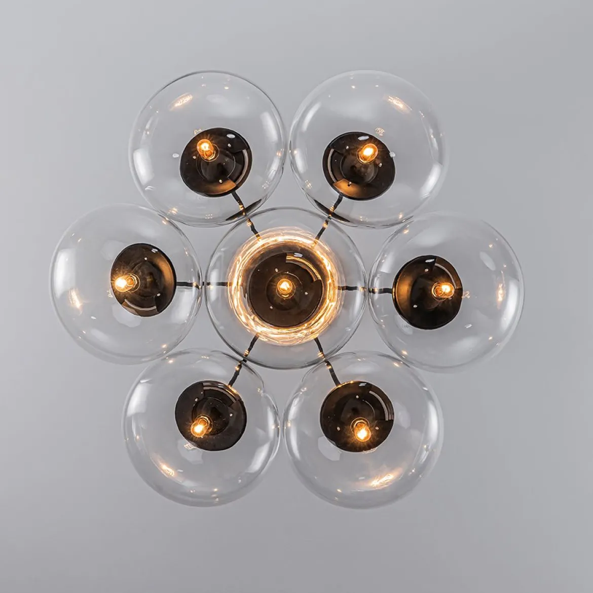 Black 7-Light Cluster Clear Glass Oval Globe Chandelier