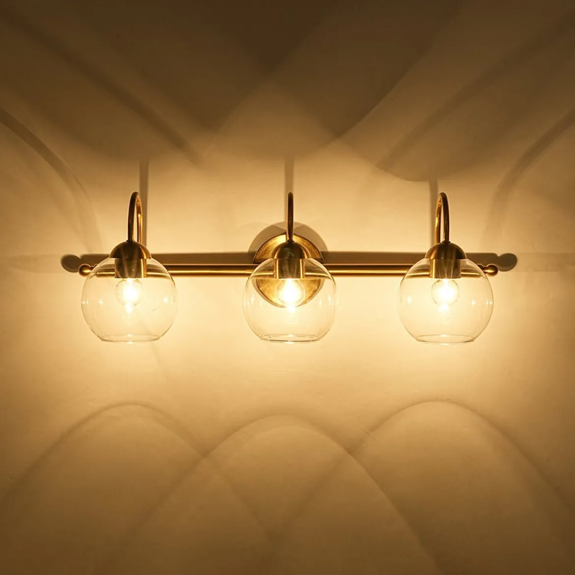 Brass Goose Arm Glass Globe 3-Light Vanity Wall Sconce