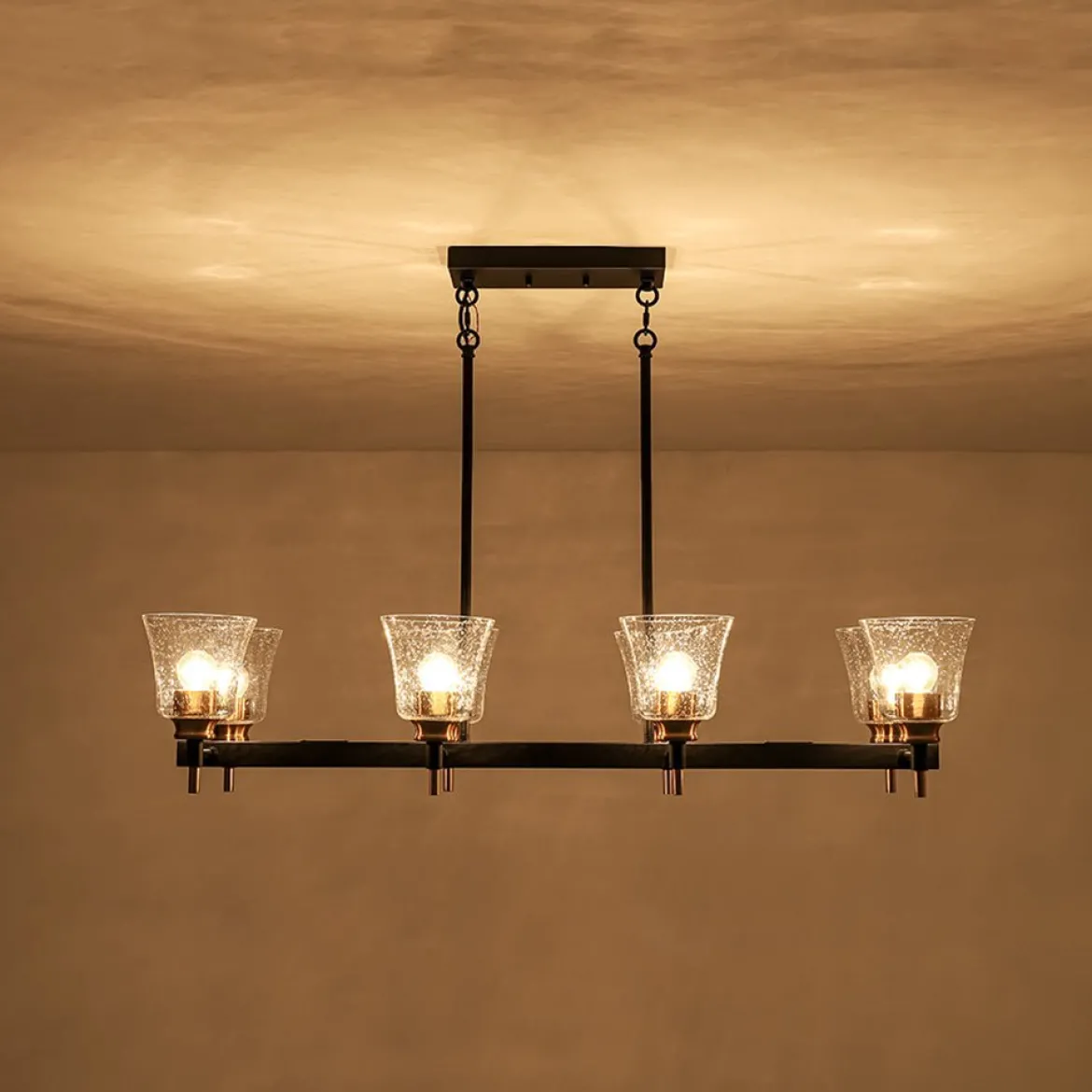 8-Light Seeded Glass Black Brass Linear Island Chandelier
